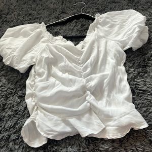 Ruch in the front and back, puff sleeves, comfortable and cute with jeans